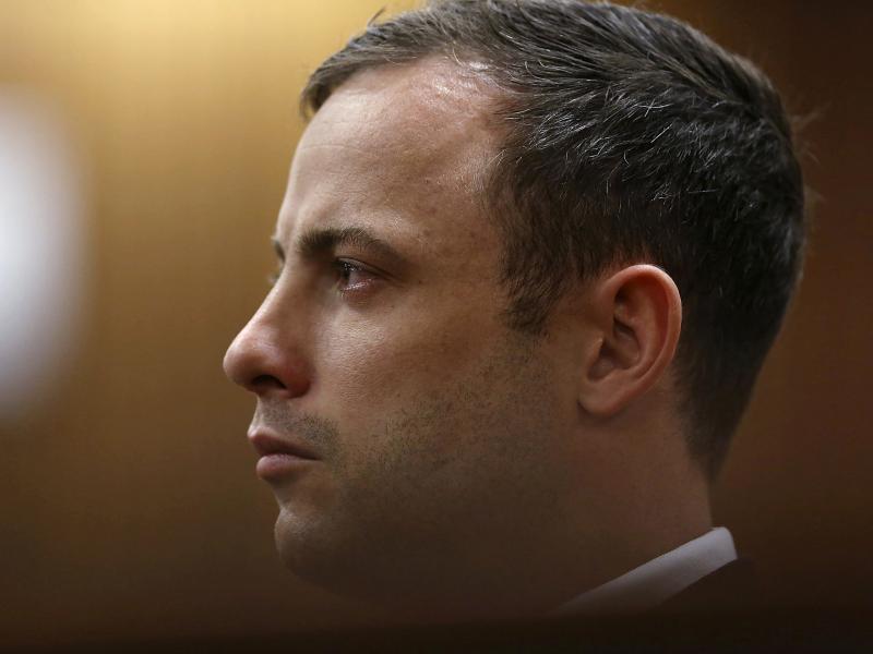 Olympic and Paralympic track star Oscar Pistorius listens to Judge Thokozile Masipa (unseen) deliver her verdict at the North Gauteng High Court in Pretoria on Friday. Olympic and Paralympic track star Oscar Pistorius listens to Judge Thokozile Masipa (unseen) deliver her verdict at the North Gauteng High Court in Pretoria on Friday.