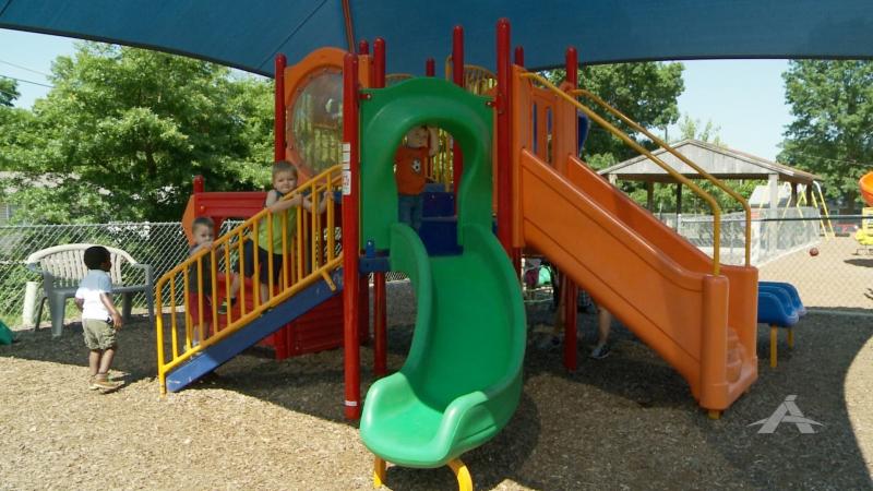 Children play on the playground at the Trinity Lutheran Child Learning Center in Columbia, Mo. Children play on the playground at the Trinity Lutheran Child Learning Center in Columbia, Mo.