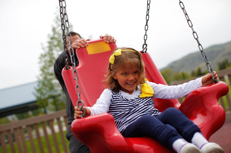 Accessible swing:There are many versions of accessible swings. Most of them provide additional back support, and they may include a safety harness. Some swings allow wheelchair users to board without leaving their wheelchairs. Accessible swing:There are many versions of accessible swings. Most of them provide additional back support, and they may include a safety harness. Some swings allow wheelchair users to board without leaving their wheelchairs.