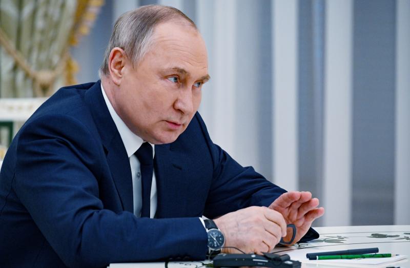 Russian President Vladimir Putin speaks to U.N. Secretary-General Antonio Guterres during their meeting in the Kremlin, in Moscow, on Tuesday. Russian President Vladimir Putin speaks to U.N. Secretary-General Antonio Guterres during their meeting in the Kremlin, in Moscow, on Tuesday.
