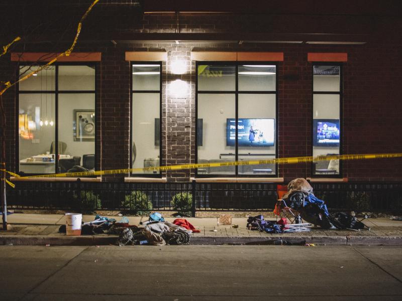 Debris litters the street at a crime scene on Sunday in Waukesha, Wis., after a person in an SUV slammed into pedestrians at a Christmas parade. Debris litters the street at a crime scene on Sunday in Waukesha, Wis., after a person in an SUV slammed into pedestrians at a Christmas parade.