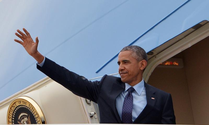 President Obama waves from Air Force One before departing from Andrews Air Force Base in Maryland on Wednesday. President Obama waves from Air Force One before departing from Andrews Air Force Base in Maryland on Wednesday.