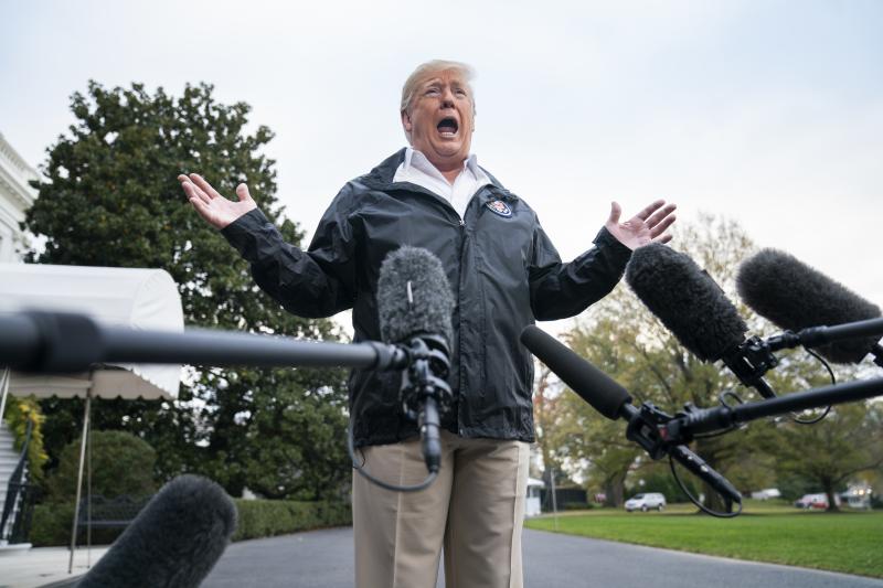 President Trump speaks to reporters before departing the White House for California in November. President Trump speaks to reporters before departing the White House for California in November.