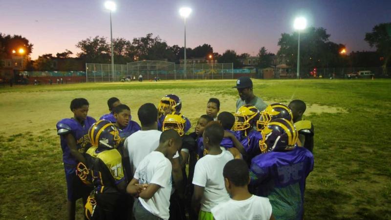 Mo Better Jaguars' coaches and players huddle at the end of practice at Betsy Head Park in Brownsville, Brooklyn in September 2014. Mo Better Jaguars' coaches and players huddle at the end of practice at Betsy Head Park in Brownsville, Brooklyn in September 2014.