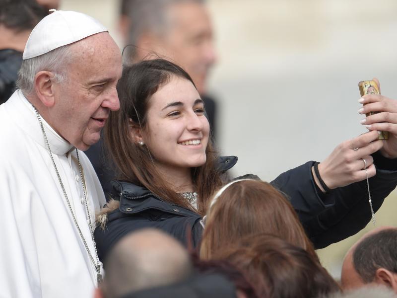 Pope Francis poses for a selfie with a young woman at the end of his weekly general audience at St Peter's square on Wednesday. The pope has now joined Instagram — although his account will be filled with press photos, not with selfies. Pope Francis poses for a selfie with a young woman at the end of his weekly general audience at St Peter's square on Wednesday. The pope has now joined Instagram — although his account will be filled with press photos, not with selfies.