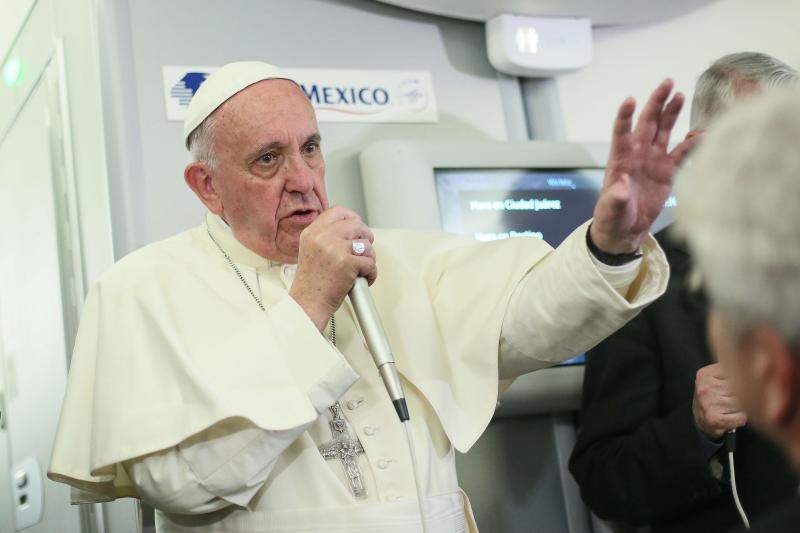 Pope Francis speaks to journalists Thursday aboard a flight from Mexico to Italy. Pope Francis speaks to journalists Thursday aboard a flight from Mexico to Italy.