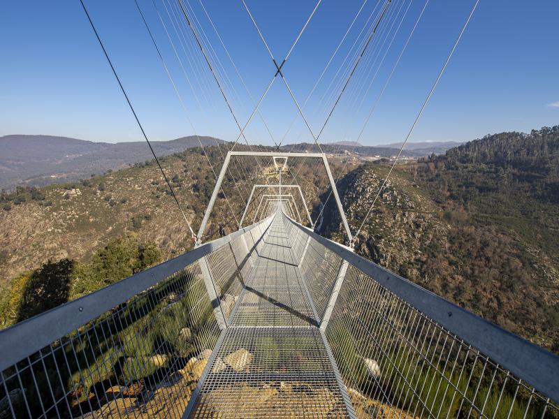 The 516 Arouca, the longest pedestrian suspension bridge in the world, hangs above the Aguieiras Waterfall in the Paiva Gorge in Arouca, Portugal. It is opening to the public next week. The 516 Arouca, the longest pedestrian suspension bridge in the world, hangs above the Aguieiras Waterfall in the Paiva Gorge in Arouca, Portugal. It is opening to the public next week.