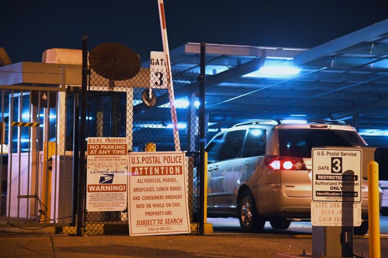 A car enters the United States Postal Service Processing and Distribution Center in Los Angeles on Wednesday. A car enters the United States Postal Service Processing and Distribution Center in Los Angeles on Wednesday.