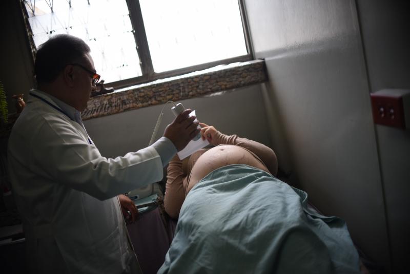 A pregnant woman gets an ultrasound in Guatemala City on Feb. 2, monitoring for the birth defect microcephaly. A pregnant woman gets an ultrasound in Guatemala City on Feb. 2, monitoring for the birth defect microcephaly.
