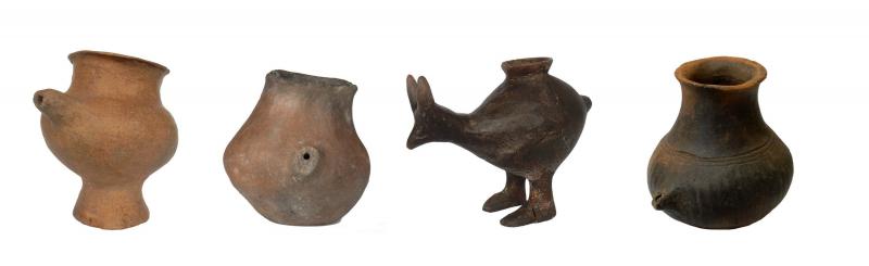A selection of small feeding vessels dating back to the late Bronze Age and early Iron Age. Researchers now say vessels like these were used as prehistoric baby bottles. A selection of small feeding vessels dating back to the late Bronze Age and early Iron Age. Researchers now say vessels like these were used as prehistoric baby bottles.