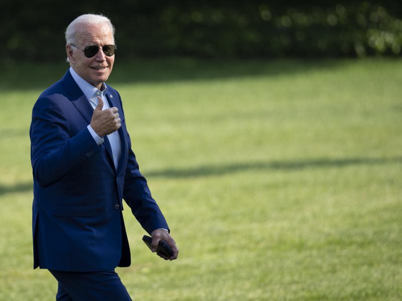 President Joe Biden gestures toward reporters as he departs Marine One and walks to the Oval Office on the South Lawn of the White House on July 20. President Joe Biden gestures toward reporters as he departs Marine One and walks to the Oval Office on the South Lawn of the White House on July 20.