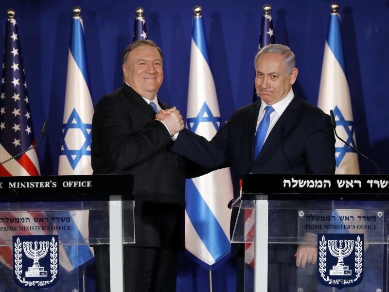 U.S. Secretary of State Mike Pompeo, left, shakes hands with Israeli Prime Minister Benjamin Netanyahu in Jerusalem Thursday. U.S. Secretary of State Mike Pompeo, left, shakes hands with Israeli Prime Minister Benjamin Netanyahu in Jerusalem Thursday.