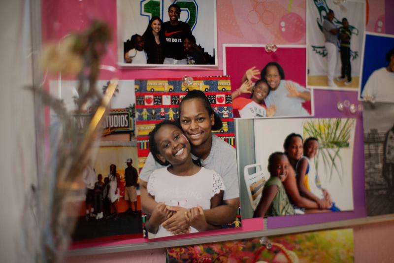 Photos of Daidre Kimp with her children posted on a bulletin board in her room. Photos of Daidre Kimp with her children posted on a bulletin board in her room.