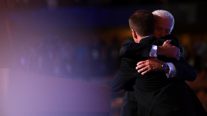 Joe Biden and his son, the late Beau Biden, embrace at the 2008 Democratic National Convention in Denver. Beau Biden delivered the keynote address that year. He died seven years later from brain cancer. Joe Biden and his son, the late Beau Biden, embrace at the 2008 Democratic National Convention in Denver. Beau Biden delivered the keynote address that year. He died seven years later from brain cancer.