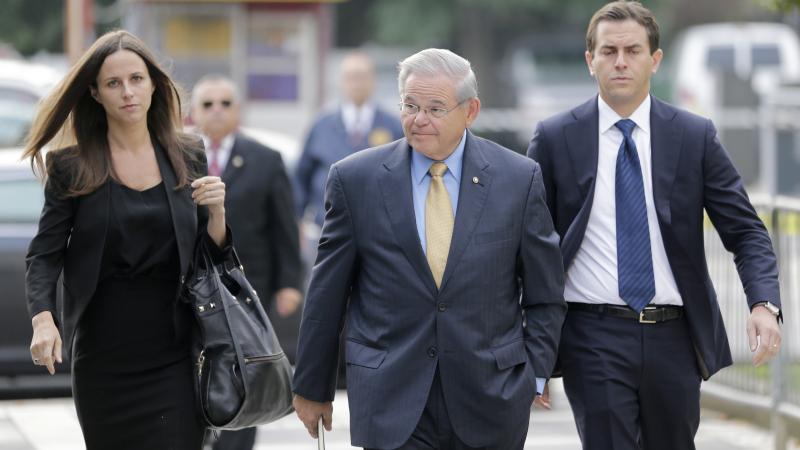 Sen. Bob Menendez (center) arrives with his children to court in Newark on Wednesday. Sen. Bob Menendez (center) arrives with his children to court in Newark on Wednesday.