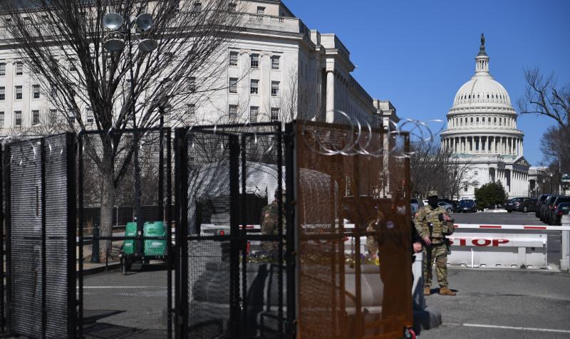 Members of the National Guard patrol near the U.S. Capitol in March in Washington. Members of the National Guard patrol near the U.S. Capitol in March in Washington.