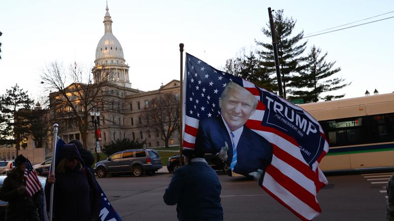 Supporters of then-President Donald Trump gather outside the Michigan State Capitol in 2020. Supporters of then-President Donald Trump gather outside the Michigan State Capitol in 2020.