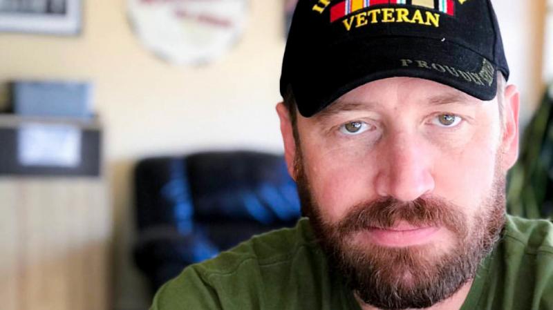 "I think in a lot of ways, we survived that deployment in Iraq by sharing humor with each other," said former Army Spc. Garett Reppenhagen, seen at home in Colorado Springs, Colo. "I think in a lot of ways, we survived that deployment in Iraq by sharing humor with each other," said former Army Spc. Garett Reppenhagen, seen at home in Colorado Springs, Colo.
