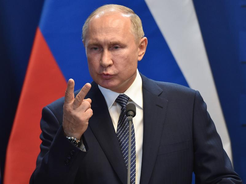 Russian President Vladimir Putin has signed a law giving the government the right to register individual journalists and bloggers as foreign agents. Putin is seen here in Budapest in October. Russian President Vladimir Putin has signed a law giving the government the right to register individual journalists and bloggers as foreign agents. Putin is seen here in Budapest in October.