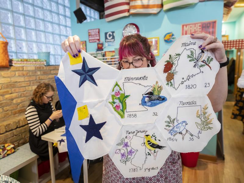 Jenni Grover holds a collection of finished patches from a quilt created by more than 100 volunteers across the country. The plans for the quilt were discovered at the estate sale of 99-year-old Rita Smith, who died earlier this year. Several dozen volunt Jenni Grover holds a collection of finished patches from a quilt created by more than 100 volunteers across the country. The plans for the quilt were discovered at the estate sale of 99-year-old Rita Smith, who died earlier this year. Several dozen volunt