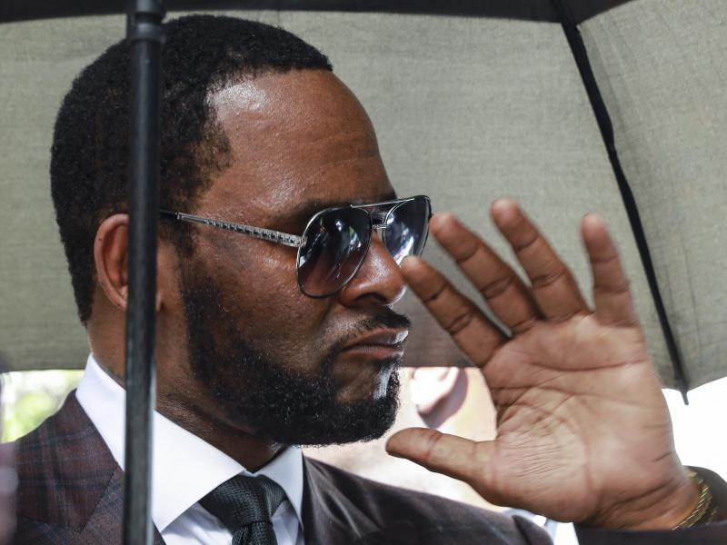 This June photo of R. Kelly shows him departing a courtroom in Chicago in a case related to a state sexual abuse case. On Thursday, federal prosecutors said an additional criminal prosecution against Kelly has been launched. This June photo of R. Kelly shows him departing a courtroom in Chicago in a case related to a state sexual abuse case. On Thursday, federal prosecutors said an additional criminal prosecution against Kelly has been launched.