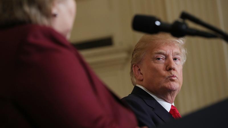 President Trump listens as Norwegian Prime Minister Erna Solberg speaks at a joint news conference Wednesday. At an Oval Office meeting on immigration policy, Trump said the U.S. should want more people from countries like Norway, disparaging Haiti and wh President Trump listens as Norwegian Prime Minister Erna Solberg speaks at a joint news conference Wednesday. At an Oval Office meeting on immigration policy, Trump said the U.S. should want more people from countries like Norway, disparaging Haiti and wh