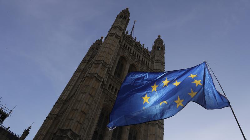 A European Union flag flies Monday outside the Parliament building in London. The multinational bloc has agreed to grant the U.K. another Brexit delay, bumping the deadline to the end of January. A European Union flag flies Monday outside the Parliament building in London. The multinational bloc has agreed to grant the U.K. another Brexit delay, bumping the deadline to the end of January.