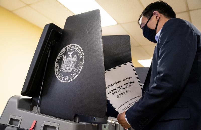 New York City Democratic mayoral candidate Andrew Yang prepares to cast his ballot at an early voting site last week. The election provides America's biggest-yet test for ranked-choice voting. New York City Democratic mayoral candidate Andrew Yang prepares to cast his ballot at an early voting site last week. The election provides America's biggest-yet test for ranked-choice voting.