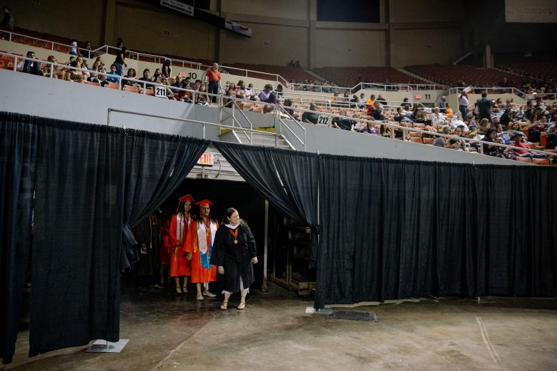Salutatorian Paulette Olivas, left, stages with fellow Trevor G. Browne High School graduates at the Veterans Colosseum before 2019 Commencement in Phoenix, Ariz. Salutatorian Paulette Olivas, left, stages with fellow Trevor G. Browne High School graduates at the Veterans Colosseum before 2019 Commencement in Phoenix, Ariz.