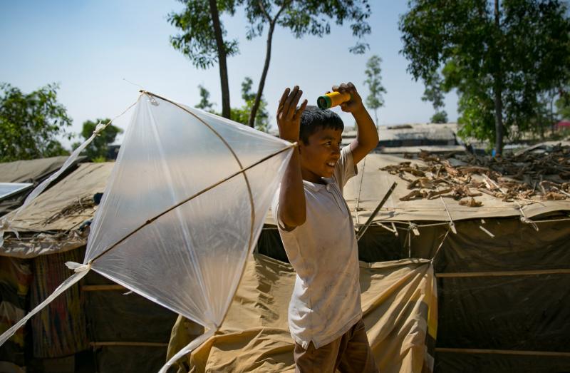 Fayes Khamal tests out a kite he's just made in the Hakimpara Rohingya refugee camp in Bangladesh. Fayes Khamal tests out a kite he's just made in the Hakimpara Rohingya refugee camp in Bangladesh.