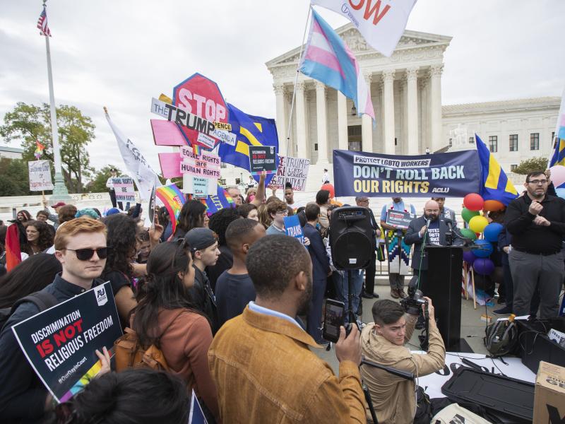 LGBTQ supporters gather in front of the U.S. Supreme Court on Oct. 8, 2019. LGBTQ supporters gather in front of the U.S. Supreme Court on Oct. 8, 2019.