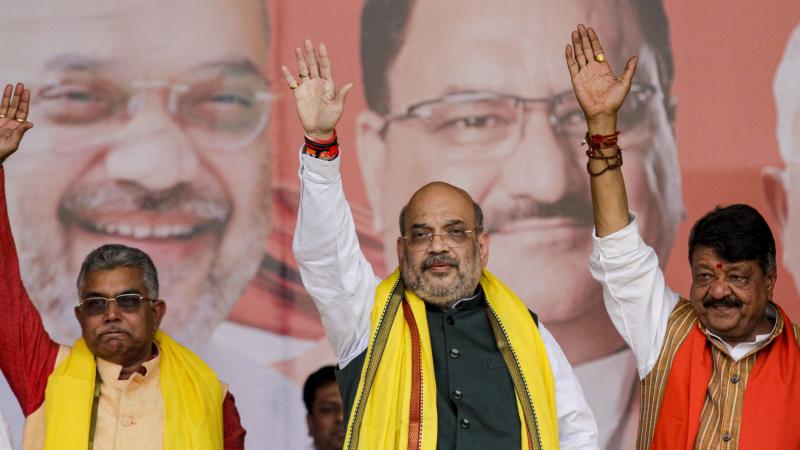 India Home Minister Amit Shah (center) introduced India's new citizenship law that fast-tracks naturalization for some non-Muslim migrants. Opponents say it violates India's secular constitution. India Home Minister Amit Shah (center) introduced India's new citizenship law that fast-tracks naturalization for some non-Muslim migrants. Opponents say it violates India's secular constitution.