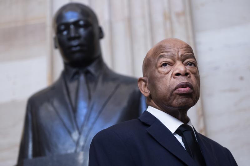 Georgia Rep. John Lewis near the statue of Martin Luther King Jr. in the Capitol Rotunda in Washington, D.C., earlier this year. At StoryCorps in 2018, Lewis talked about meeting King in Montgomery, Ala., at 18. Georgia Rep. John Lewis near the statue of Martin Luther King Jr. in the Capitol Rotunda in Washington, D.C., earlier this year. At StoryCorps in 2018, Lewis talked about meeting King in Montgomery, Ala., at 18.