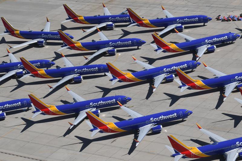 Boeing 737 Max aircraft operated by Southwest Airlines crowd the tarmac of the airport in Victorville, Calif., after the Federal Aviation Administration grounded the planes last year. Boeing 737 Max aircraft operated by Southwest Airlines crowd the tarmac of the airport in Victorville, Calif., after the Federal Aviation Administration grounded the planes last year.