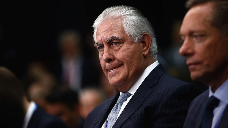 Rex Tillerson, chief executive officer of Exxon Mobile Corp., left, listens on the opening day of the St. Petersburg International Economic Forum this past June. Rex Tillerson, chief executive officer of Exxon Mobile Corp., left, listens on the opening day of the St. Petersburg International Economic Forum this past June.