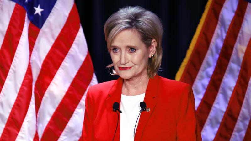 Sen. Cindy Hyde-Smith, R-Miss., seen at a debate with Democrat Mike Espy in Jackson, Miss., won a runoff election to hold her seat on Tuesday. Sen. Cindy Hyde-Smith, R-Miss., seen at a debate with Democrat Mike Espy in Jackson, Miss., won a runoff election to hold her seat on Tuesday.