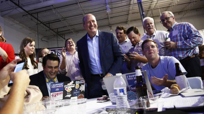Dan Bishop, center, smiles as he gets up from the table after looking at election results with supporters during an election night party Tuesday in Monroe, N.C. September 10, 2019 in Monroe, N.C. Dan Bishop, center, smiles as he gets up from the table after looking at election results with supporters during an election night party Tuesday in Monroe, N.C. September 10, 2019 in Monroe, N.C.