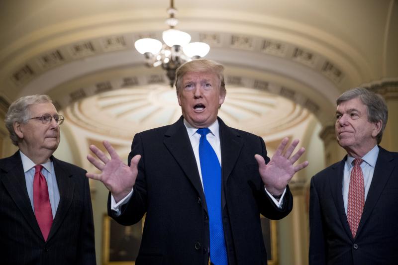 President Trump speaks to reporters as he arrives for a Senate Republican lunch on Capitol Hill on Tuesday. President Trump speaks to reporters as he arrives for a Senate Republican lunch on Capitol Hill on Tuesday.