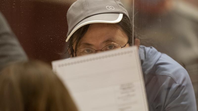 An election worker shows ballots to representatives of then-President Donald Trump during a recount on Nov. 20 in Madison, Wis. Republican lawmakers in Wisconsin and Pennsylvania have begun new investigations into the 2020 election. An election worker shows ballots to representatives of then-President Donald Trump during a recount on Nov. 20 in Madison, Wis. Republican lawmakers in Wisconsin and Pennsylvania have begun new investigations into the 2020 election.