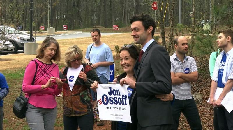 Democratic congressional candidate Jon Ossoff poses with supporters outside the East Roswell Branch Library in Roswell, Ga. Democratic congressional candidate Jon Ossoff poses with supporters outside the East Roswell Branch Library in Roswell, Ga.