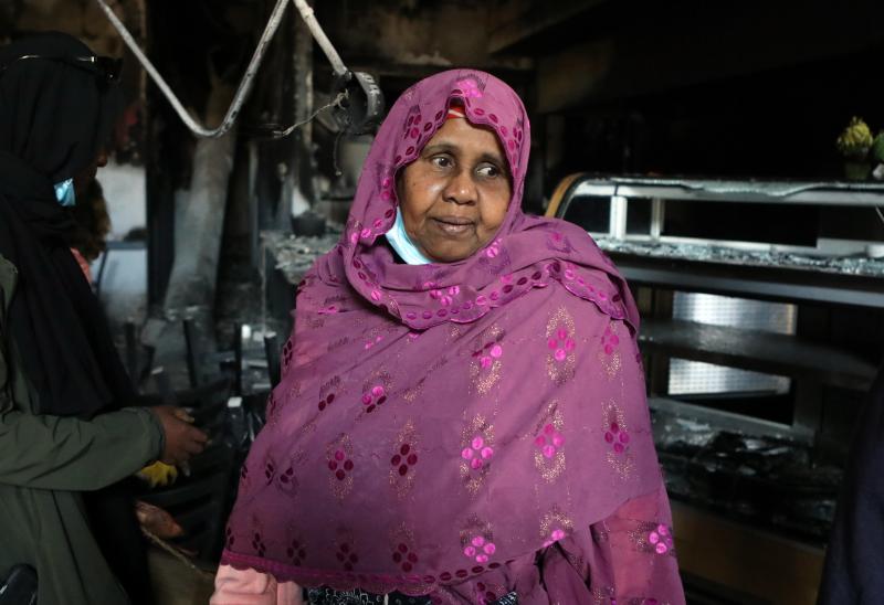 Safia Munye looks over the remains of her restaurant, Mama Safia's Kitchen, on Saturday. It was destroyed last week during protests in Minneapolis. Safia Munye looks over the remains of her restaurant, Mama Safia's Kitchen, on Saturday. It was destroyed last week during protests in Minneapolis.