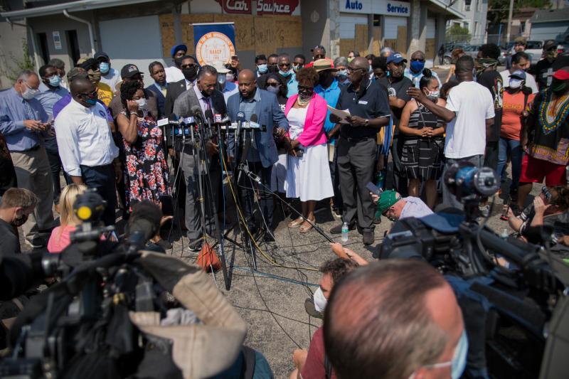 The Rev. Jesse Jackson spoke at a press briefing Thursday in Kenosha, Wis., in the parking lot of Bert and Rudy's Auto Service, where two protesters were shot and killed Tuesday night. The Rev. Jesse Jackson spoke at a press briefing Thursday in Kenosha, Wis., in the parking lot of Bert and Rudy's Auto Service, where two protesters were shot and killed Tuesday night.
