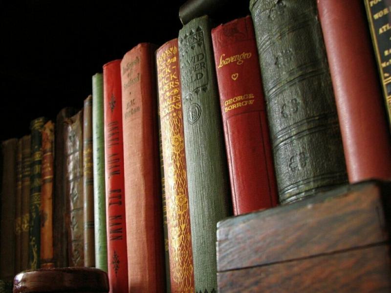 Old books on a shelf. Old books on a shelf.