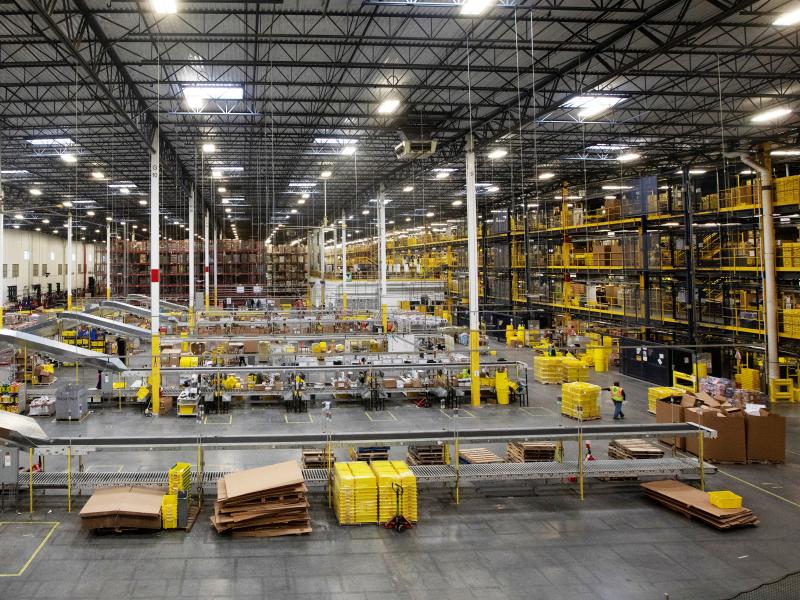 Workers at an Amazon fulfillment center in Robbinsville, N.J., were sickened on Wednesday after an automated machine punctured a can of bear repellent. The warehouse is seen here in June. Workers at an Amazon fulfillment center in Robbinsville, N.J., were sickened on Wednesday after an automated machine punctured a can of bear repellent. The warehouse is seen here in June.