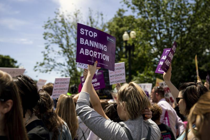 Abortion-rights supporters demonstrate last May in front of the U.S. Supreme Court in Washington. A high court decision in a case that could curtail or even overturn Roe v. Wade is set for opening arguments in March. Abortion-rights supporters demonstrate last May in front of the U.S. Supreme Court in Washington. A high court decision in a case that could curtail or even overturn Roe v. Wade is set for opening arguments in March.