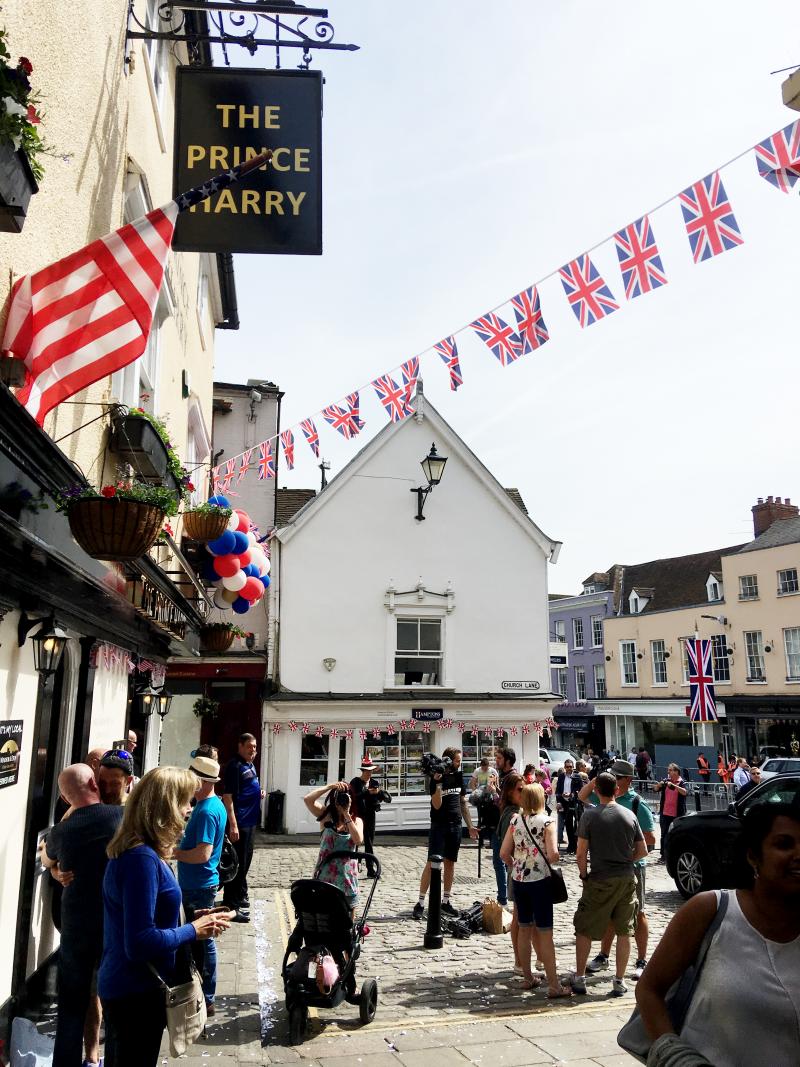 People gather outside the Prince Harry pub in Windsor, England. People gather outside the Prince Harry pub in Windsor, England.