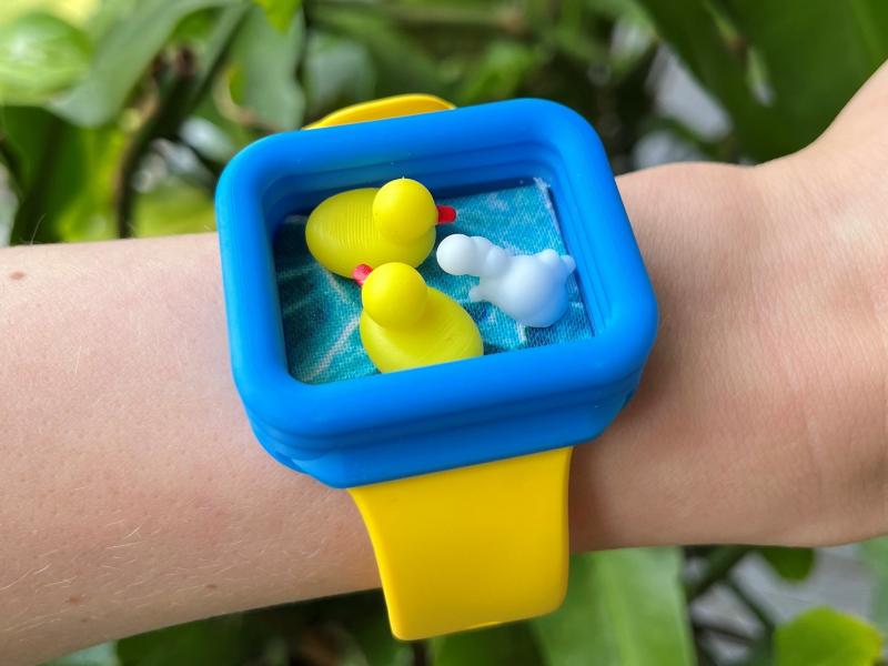 When you check one of the watches made by Kevin Bertolero, you'll find tiny magnetic ducks instead of the time. When you check one of the watches made by Kevin Bertolero, you'll find tiny magnetic ducks instead of the time.