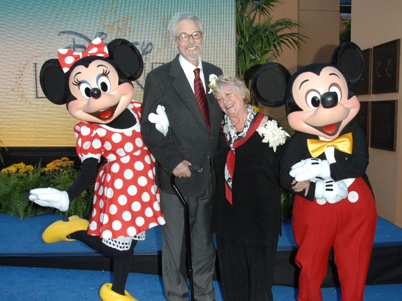 Russi Taylor and her husband Bruce Allwine pose with their characters Minnie and Mickey Mouse at the 2008 Disney Legends Ceremony at the Walt Disney Studios in Burbank, California. Russi Taylor and her husband Bruce Allwine pose with their characters Minnie and Mickey Mouse at the 2008 Disney Legends Ceremony at the Walt Disney Studios in Burbank, California.