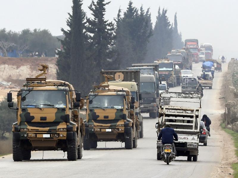 A Turkish military convoy drives in the east of Idlib on Feb. 28. A Turkish military convoy drives in the east of Idlib on Feb. 28.