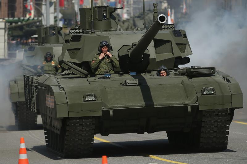 Russian Army T-14 Armata tanks drive towards Red Square to participate in the annual Victory Day Parade. Russian Army T-14 Armata tanks drive towards Red Square to participate in the annual Victory Day Parade.